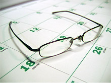 Foto: Brille auf Termin-Kalender